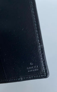 Neu mit Etikett: Gucci GG gepolsterte Bifold-Passhüllen-Brieftasche, Schwarz, hergestellt in Italien 
