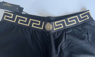 Neu mit Etikett: Schwarze Herren-Trainingshose mit Medusa und Greca-Bordüre von Versace, Größe 7 (XL), Italien 15011 