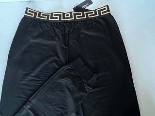 Neu mit Etikett: Schwarze Herren-Trainingshose mit Medusa und Greca-Bordüre von Versace, Größe 7 (XL), Italien 15011 