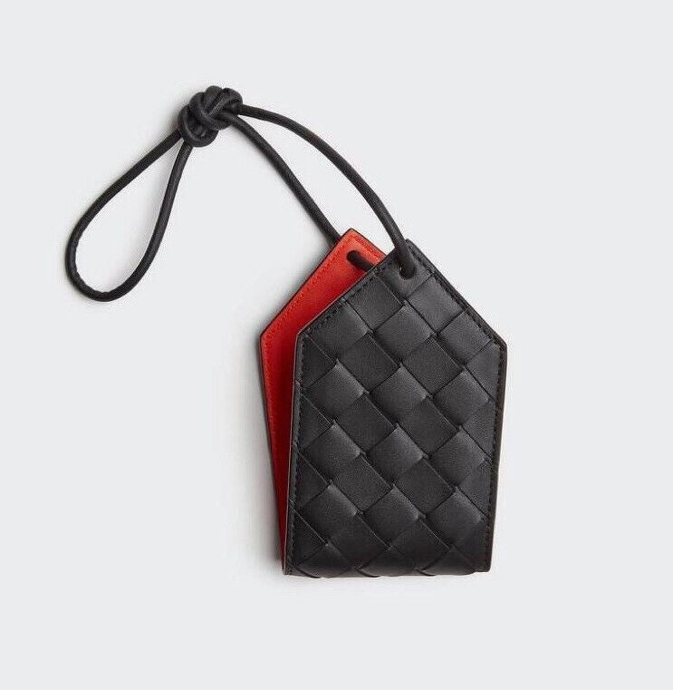 Кожаная багажная бирка Intrecciato за 330 долларов США Bottega Veneta, черная/оранжевая 629752 IT