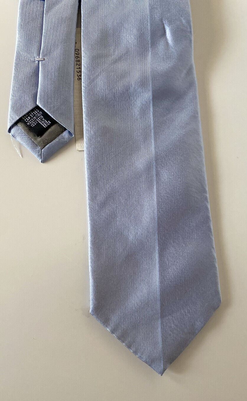 Синий галстук Armani Collezioni, сделанный в Италии, $150,00. 