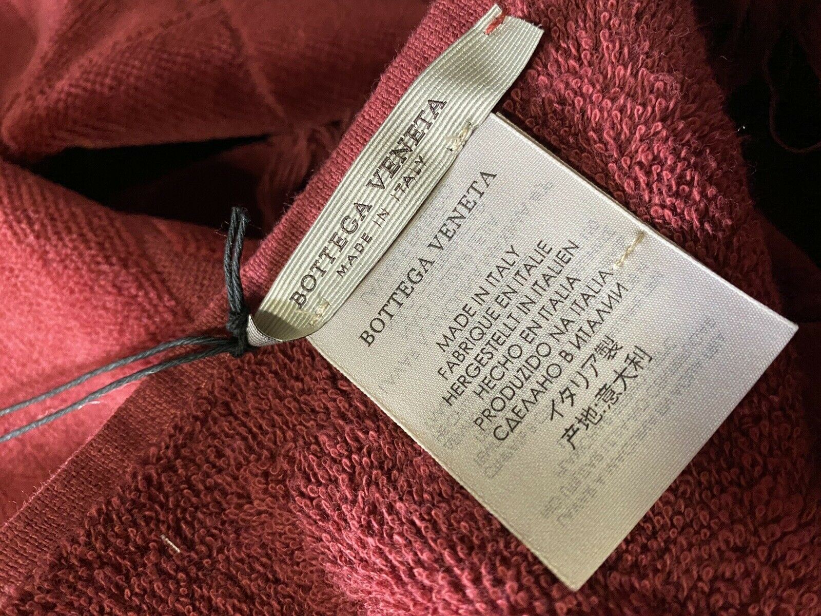Хлопковое банное/пляжное полотенце бордового цвета Bottega Veneta, 70 x 39,5, производство Италия.